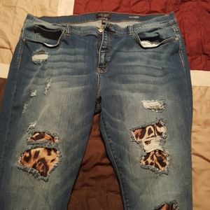 Leopard backed destructed jeans